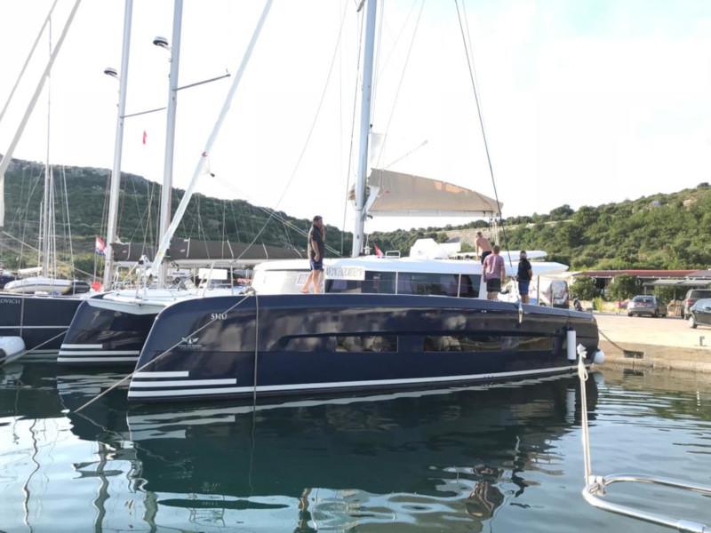 Book yachts online - catamaran - Dufour 48 Catamaran - LER - BLUE HULL, AC+GEN., UNDERWATER LIGHTS - rent