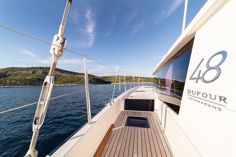 Book yachts online - catamaran - Dufour 48 Catamaran - UNO - BLUE HULL, AC+GEN., UNDERWATER LIGHTS - rent