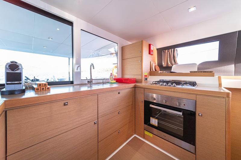 Book yachts online - catamaran - Dufour 48 Catamaran - YAM - BLUE HULL, AC+GEN., UNDERWATER LIGHTS - rent