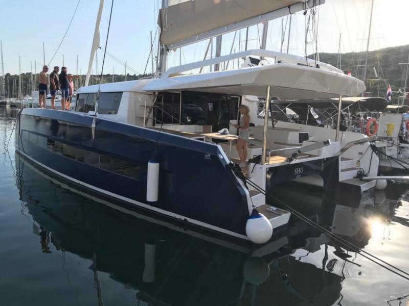 Book yachts online - catamaran - Dufour 48 Catamaran - NAMI NORI - COLOUR HULL, AC+GEN., UNDERWATER LIGHTS - rent